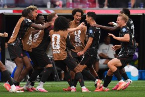 Canada players celebrate a goal against South Africa