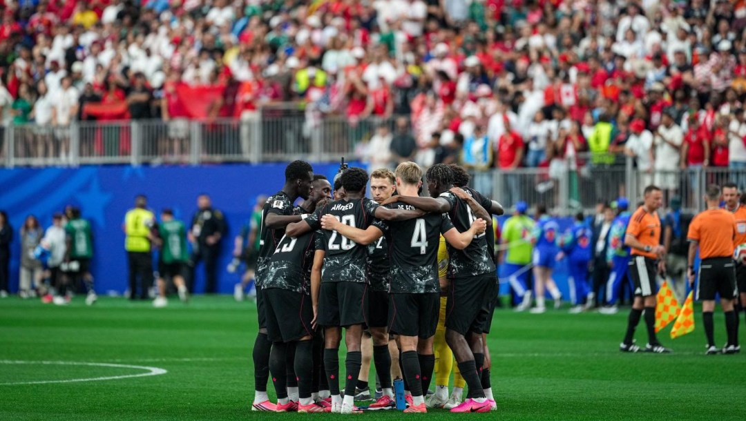 Canada players huddle before the match against Morocco