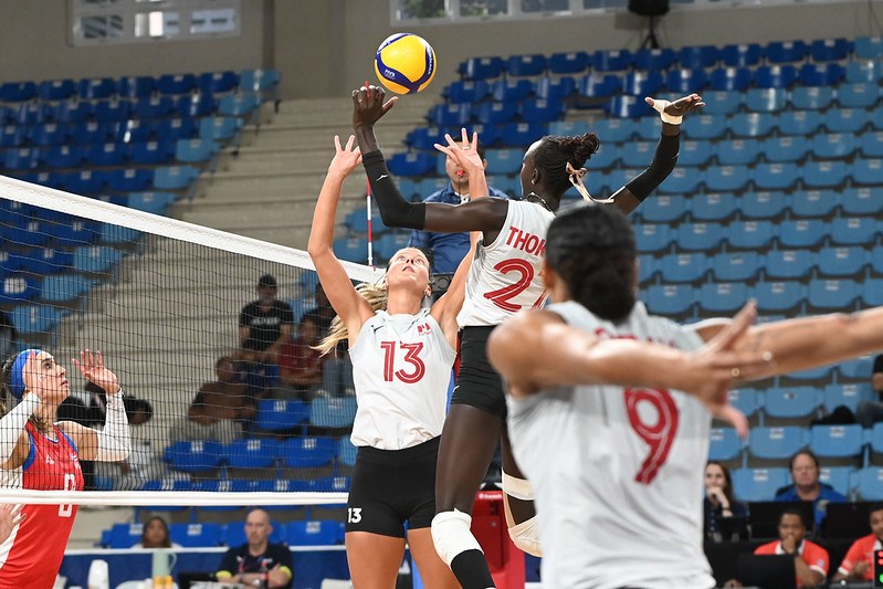Kiera Van of Canada sets against Puerto Rico.