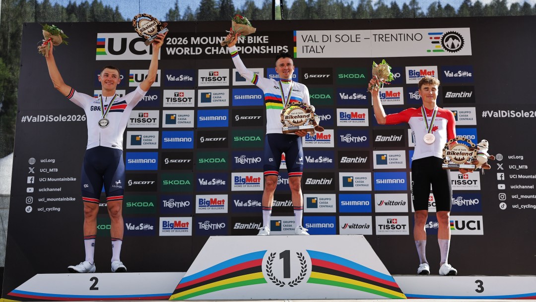 Cole Punchard celebrates a bronze medal in the Elite Men’s XCO at the 2026 UCI Mountain Bike World Championships.