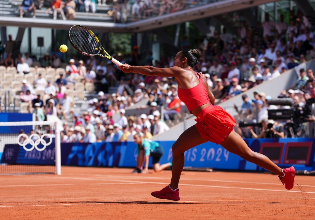 Leylah Fernandez returns a shot during her tennis match against Angelique Kerber of Germany during the 2024 Paris Olympics Games in France on Tuesday, July 30, 2024. Photo by Mark Blinch/COC MANDATORY CREDIT