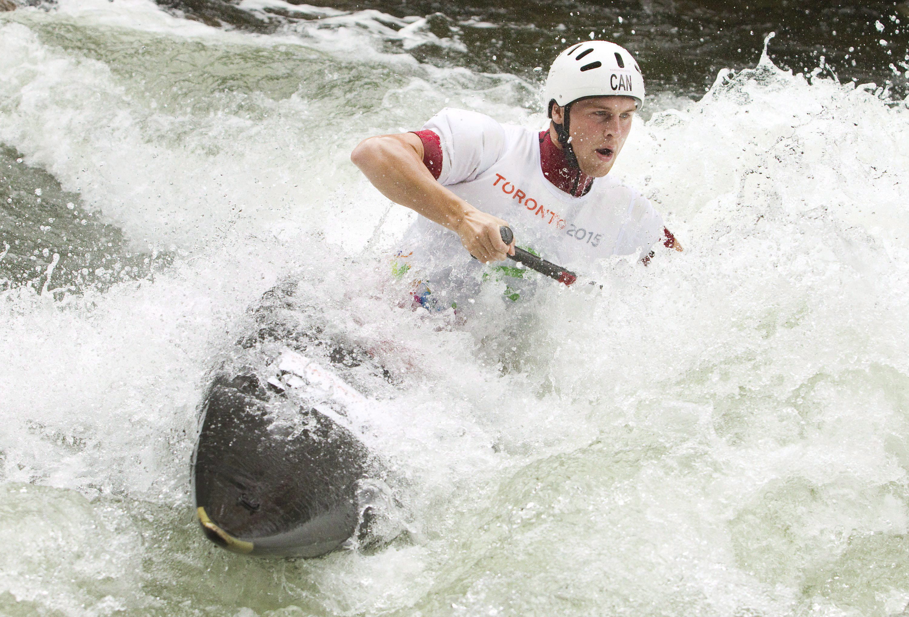 Canada's Cameron Smedley makes his semi-final run at the Minden white water course in the Men's Solo Canoe Slalom at the Toronto 2015 Pan Am Games in Minden, Ont., on Sunday, July 19, 2015. THE CANADIAN PRESS/Fred Thornhill
