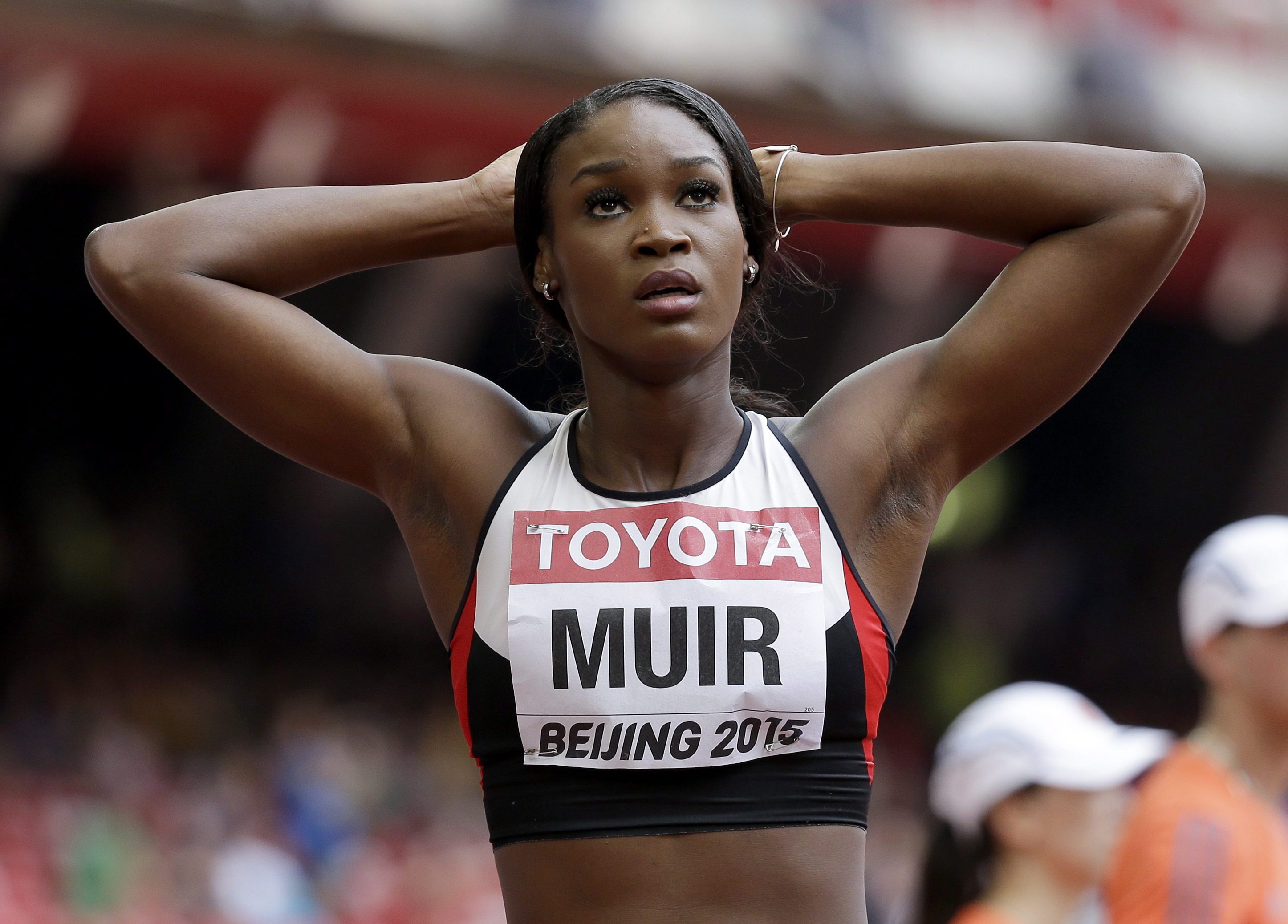 Canada's Carline Muir looks at her time following her heat of the womens 400m at the World Athletics Championships at the Bird's Nest stadium in Beijing, Monday, Aug. 24, 2015. (AP Photo/David J. Phillip)