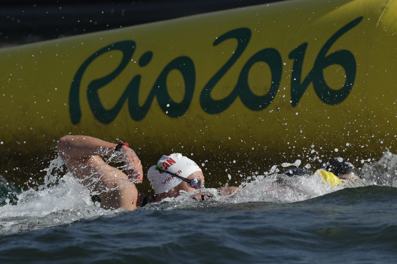 Canada's Stephanie Horner competes during the women's marathon swimming competition of the 2016 Summer Olympics in Rio de Janeiro, Brazil, Monday, Aug. 15, 2016. (AP Photo/Gregory Bull)