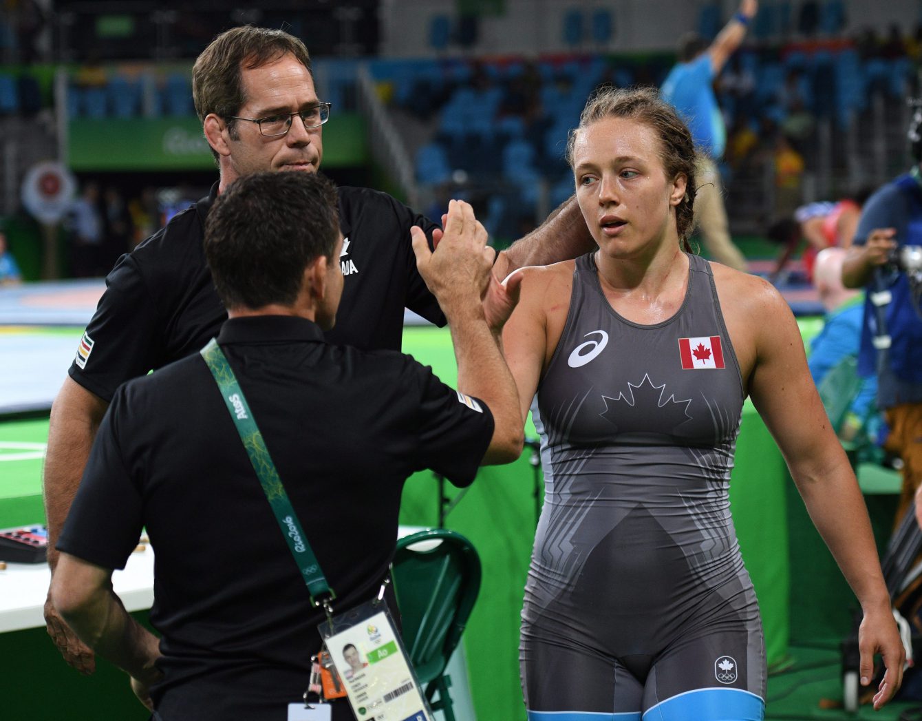 Canada's Dori Yeats is congratulated by her coaches after a win over Turkey's Buse Tosun in the women's freestyle 69kg repechage round at the 2016 Olympic Summer Games in Rio de Janeiro, Brazil on Wednesday, Aug. 17, 2016. THE CANADIAN PRESS/Sean Kilpatrick