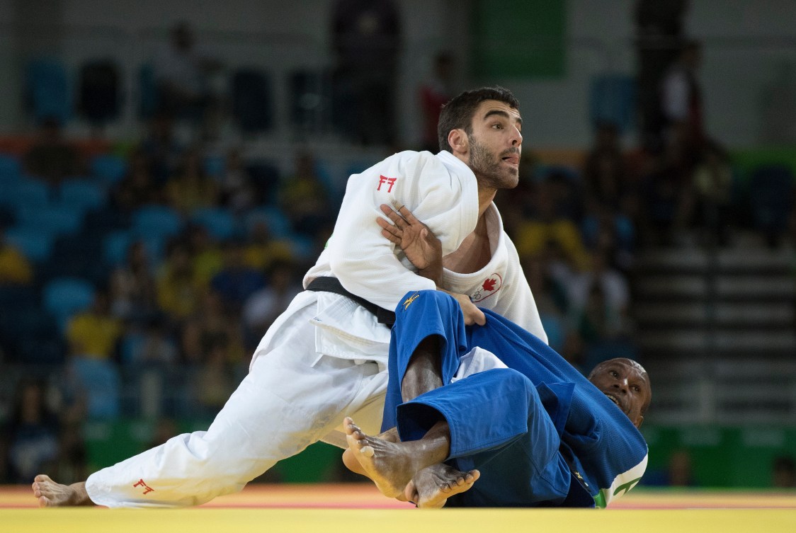 Antoine Bouchard contre Raymond Ovinou aux Jeux olympiques de Rio, le 7 août 2016. (COC Photo par Jason Ransom)