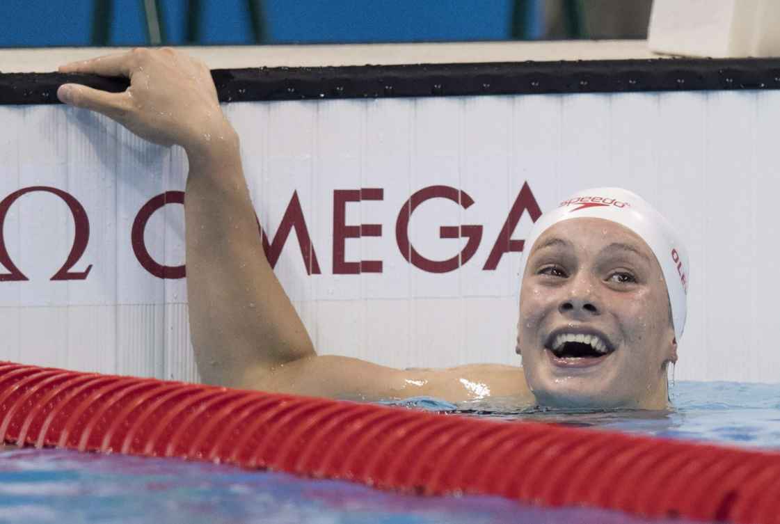Penny Oleksiak réagi après sa performance au 4x100 m papillon aux Jeux olympiques de Rio, le 7 août 2016, au Brésil / THE CANADIAN PRESS/Frank Gunn