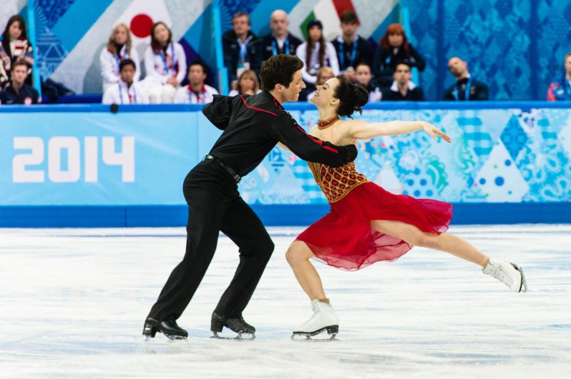 Tessa Virtue et Scott Moir lors de la compétition par équipes aux Jeux olympiques de Sotchi, le 9 février 2014. THE CANADIAN PRESS/Winston Chow