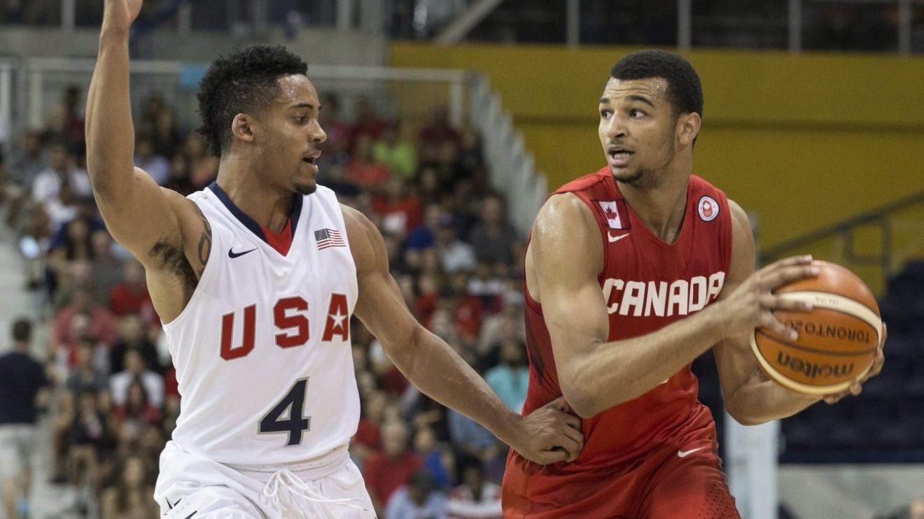 Le joueur canadien Jamal Murray est en possession du ballon lors des demi-finales du tournoi de basketball des Jeux panaméricains de Toronto, le 24 juillet 2015.